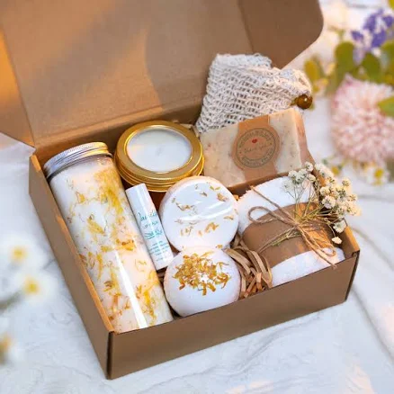 Natural Spa Gift Set for Women - Self Care Package with Candle, Bath Bomb, Shower Steamers, Bath Salts, Oatmeal Soap, Lip Balm & Face Towel