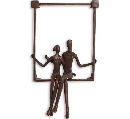 Benzara Couple Sitting on a Window Sill Iron Wall Piece